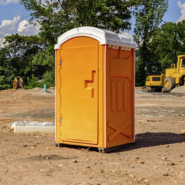 how often are the portable restrooms cleaned and serviced during a rental period in Jackson County